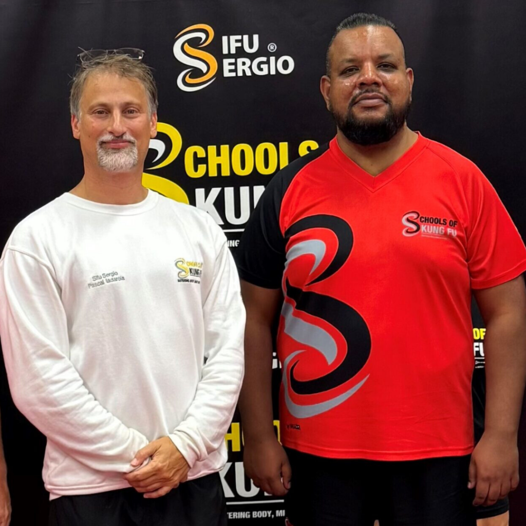Sifu Kul with Sifu Sergio smiling at the camera